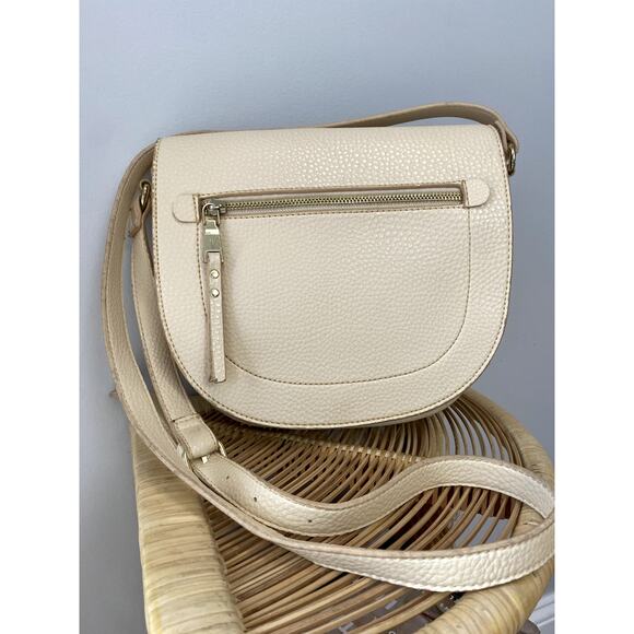 Earthtone Cream Pebbled Faux Leather Crossbody SaddleBag - Picture 1 of 13